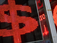 Банк России установил курс доллара ниже 77 рублей впервые с мая 2023 года