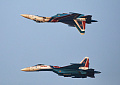 Истребители Су-30СМ пилотажной группы «Русские витязи» выполняют фигуры высшего пилотажа